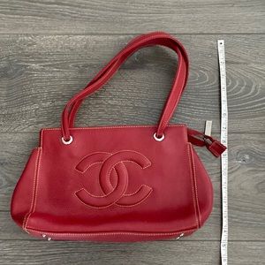 Used Genuine Leather Red handbag in good condition